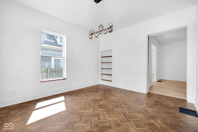 19 E Regent St, Indianapolis, IN 46225 - spare room with baseboards and built in features