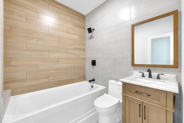 19 E Regent St, Indianapolis, IN 46225 - full bathroom with tile walls, vanity, toilet, and  shower combination