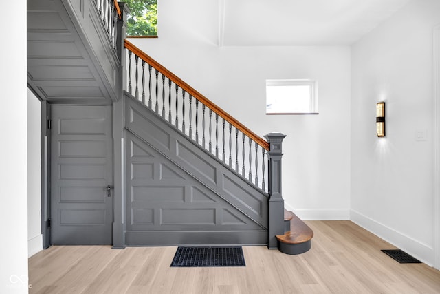 19 E Regent St, Indianapolis, IN 46225 - staircase with wood finished floors and baseboards
