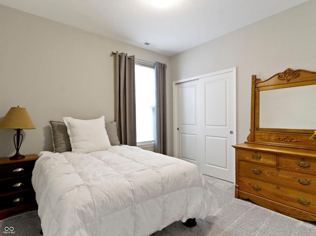 19657 Astoria Ave, Sheridan, IN 46069 - bedroom featuring light colored carpet and a closet