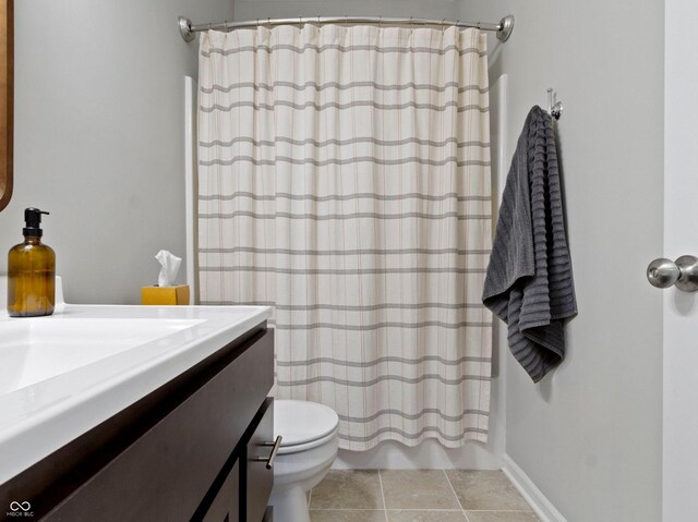 19657 Astoria Ave, Sheridan, IN 46069 - bathroom with vanity, toilet, a shower with curtain, and tile patterned flooring