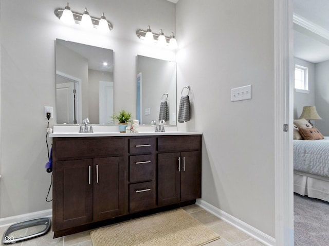 19657 Astoria Ave, Sheridan, IN 46069 - full bath with connected bathroom, double vanity, and baseboards