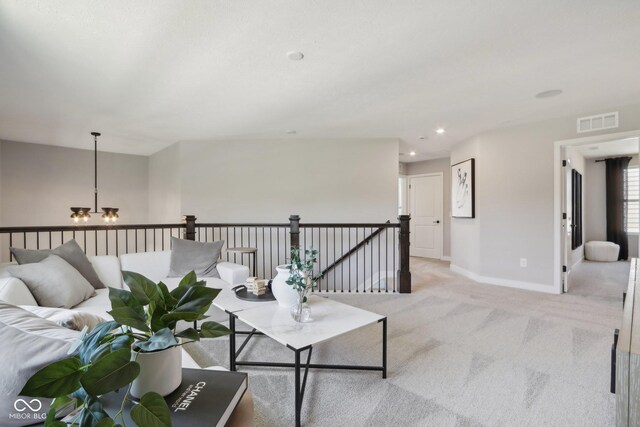 2693 Penn Ave, Plainfield, IN 46168 - living room featuring light colored carpet, baseboards, recessed lighting, and a chandelier