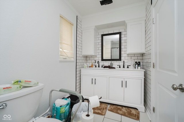 4232 Linden Ln, Anderson, IN 46011 - bathroom with vanity, crown molding, tile patterned flooring, and tasteful backsplash