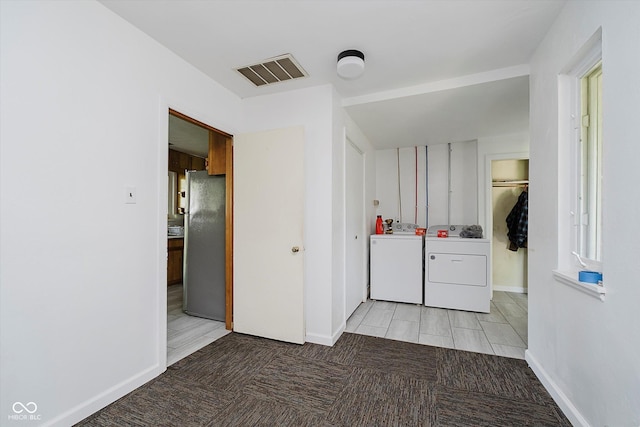 4232 Linden Ln, Anderson, IN 46011 - laundry area featuring washer and clothes dryer and baseboards