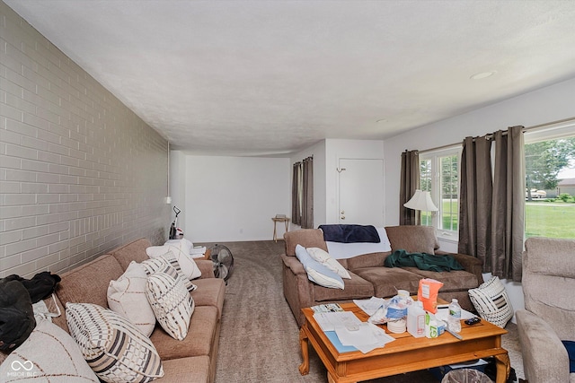 4232 Linden Ln, Anderson, IN 46011 - living area featuring brick wall and carpet floors