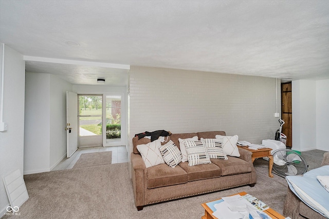 4232 Linden Ln, Anderson, IN 46011 - carpeted living area featuring brick wall