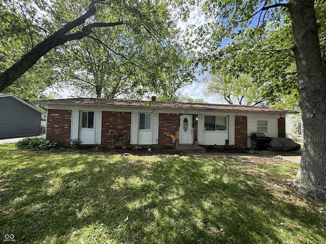 2015 Rosewood Dr, Anderson, IN 46011 - single story home featuring a front lawn and brick siding