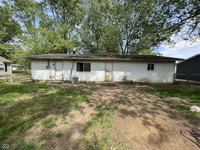 2015 Rosewood Dr, Anderson, IN 46011 - rear view of house featuring fence and central AC
