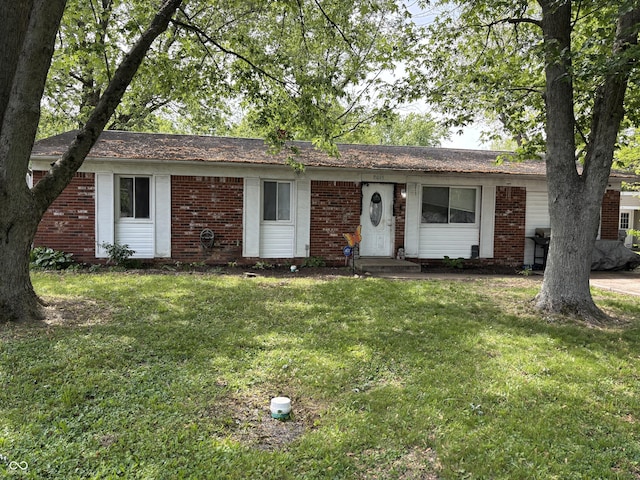 2015 Rosewood Dr, Anderson, IN 46011 - ranch-style home with brick siding and a front lawn