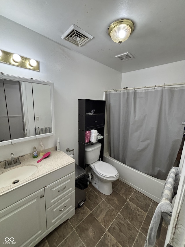 2015 Rosewood Dr, Anderson, IN 46011 - bathroom with vanity, shower / tub combo with curtain, and toilet