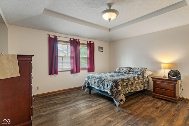 485 Mesa Dr, Russiaville, IN 46979 - bedroom with a raised ceiling, baseboards, and wood finished floors