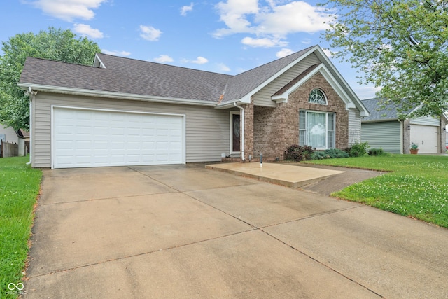 485 Mesa Dr, Russiaville, IN 46979 - single story home with a garage, a front lawn, a shingled roof, and brick siding