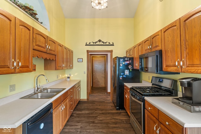 485 Mesa Dr, Russiaville, IN 46979 - kitchen featuring black appliances, a sink, dark wood-type flooring, and light countertops