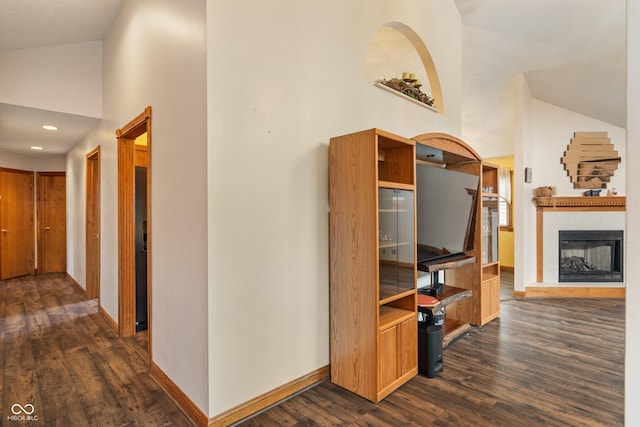 485 Mesa Dr, Russiaville, IN 46979 - corridor with dark wood-type flooring, high vaulted ceiling, baseboards, and recessed lighting