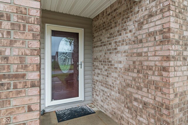 485 Mesa Dr, Russiaville, IN 46979 - doorway to property featuring brick siding
