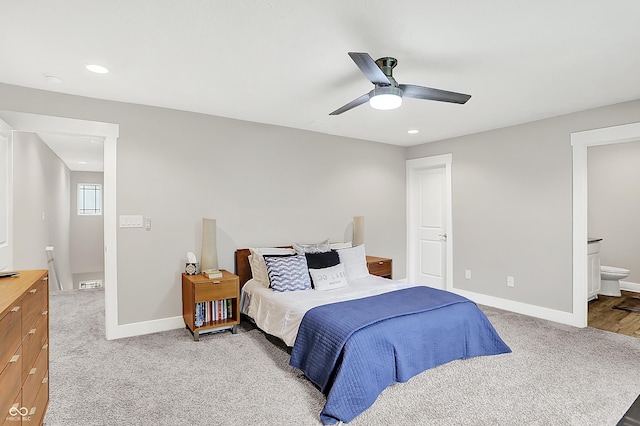 8266 Glacier Ridge Dr, Fishers, IN 46038 - bedroom with light carpet, baseboards, recessed lighting, ensuite bath, and ceiling fan