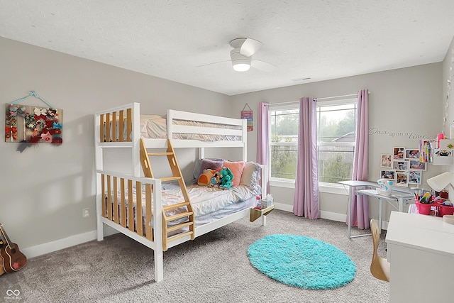 8266 Glacier Ridge Dr, Fishers, IN 46038 - bedroom featuring light carpet, baseboards, a ceiling fan, and a textured ceiling