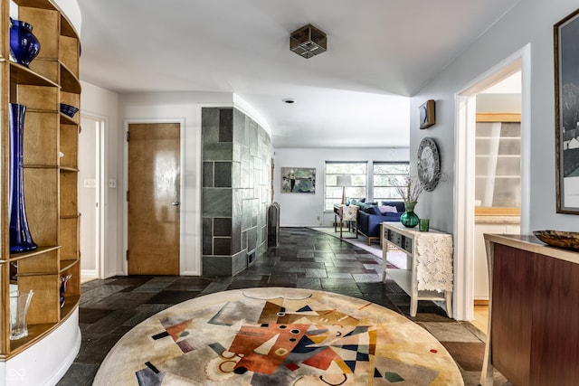 6220 Spring Mill Rd, Indianapolis, IN 46260 - dining area with stone tile floors and baseboards