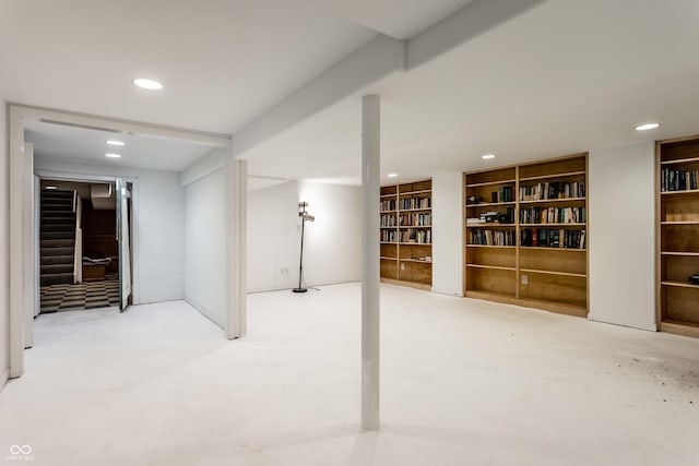 6220 Spring Mill Rd, Indianapolis, IN 46260 - finished below grade area with stairway, recessed lighting, and built in shelves