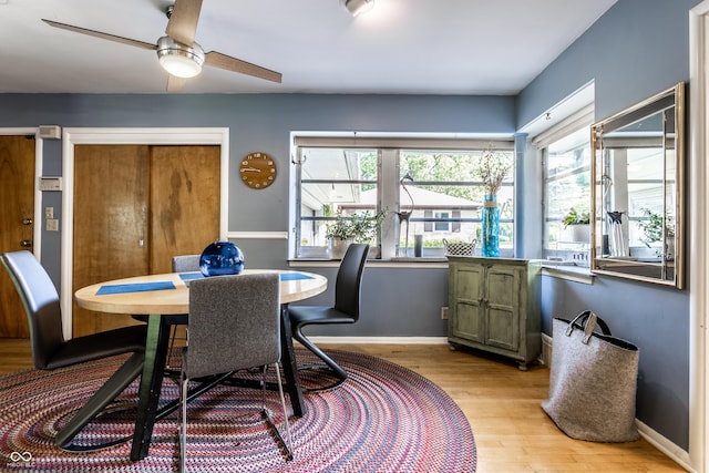 6220 Spring Mill Rd, Indianapolis, IN 46260 - dining area featuring light wood-style flooring, ceiling fan, and baseboards