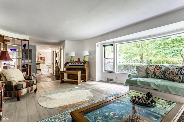 6220 Spring Mill Rd, Indianapolis, IN 46260 - living area with hardwood / wood-style floors and baseboards