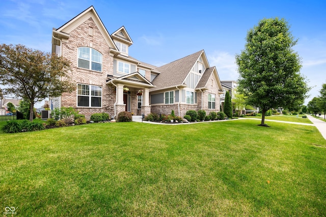 15580 Garrano Ln, Fishers, IN 46040 - craftsman-style home featuring brick siding and a front lawn