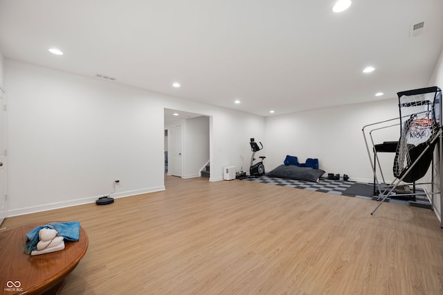 15580 Garrano Ln, Fishers, IN 46040 - workout room featuring wood finished floors, recessed lighting, and baseboards