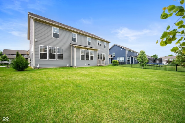 15580 Garrano Ln, Fishers, IN 46040 - rear view of house with a trampoline