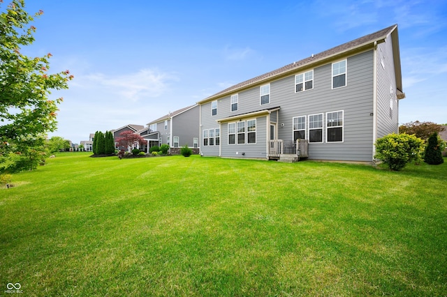 15580 Garrano Ln, Fishers, IN 46040 - rear view of property with a lawn