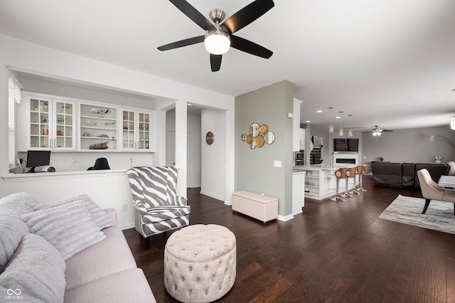 15580 Garrano Ln, Fishers, IN 46040 - living room with a ceiling fan, dark wood-type flooring, recessed lighting, and baseboards