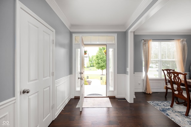 15580 Garrano Ln, Fishers, IN 46040 - foyer with wainscoting, a decorative wall, dark wood-style flooring, and crown molding