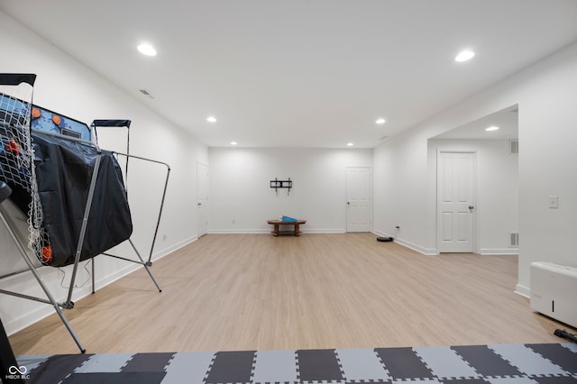 15580 Garrano Ln, Fishers, IN 46040 - exercise room with light wood-type flooring, recessed lighting, and baseboards