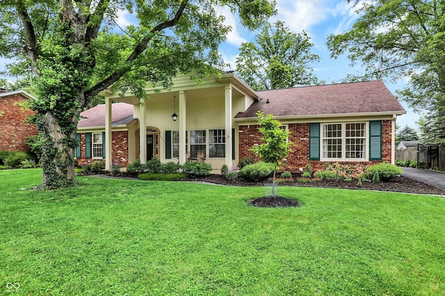 6605 Grosvenor Pl, Indianapolis, IN 46220 - view of front of house with brick siding