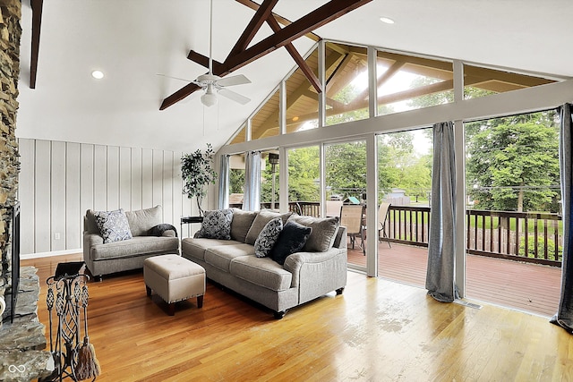 6605 Grosvenor Pl, Indianapolis, IN 46220 - living room featuring ceiling fan, light wood-style flooring, high vaulted ceiling, and beam ceiling