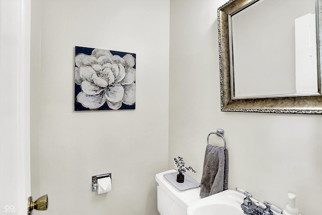 6605 Grosvenor Pl, Indianapolis, IN 46220 - bathroom with toilet and a sink
