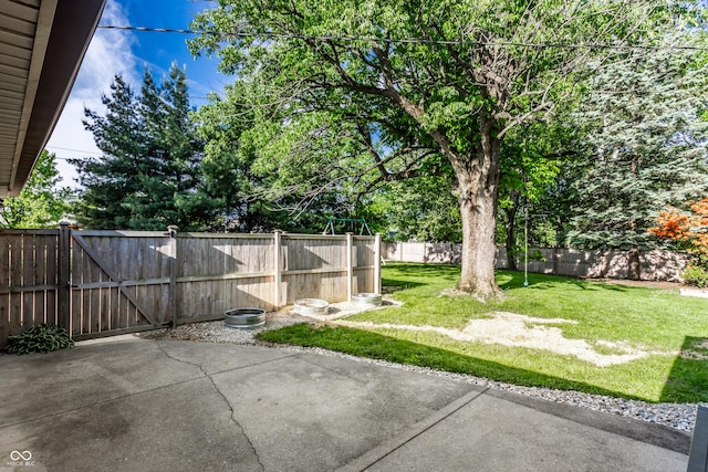 7110 N Layman Ave, Indianapolis, IN 46250 - view of yard featuring a patio area