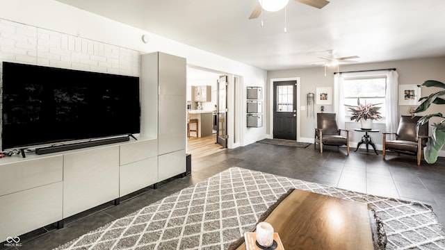 7110 N Layman Ave, Indianapolis, IN 46250 - living room with dark tile patterned floors and ceiling fan