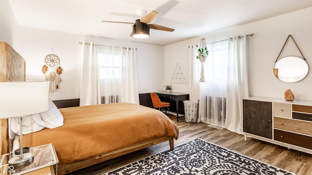 7110 N Layman Ave, Indianapolis, IN 46250 - bedroom featuring wood finished floors and ceiling fan