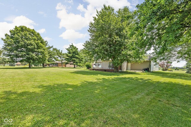 3020 E 400 S, Lebanon, IN 46052 - view of green lawn featuring a deck