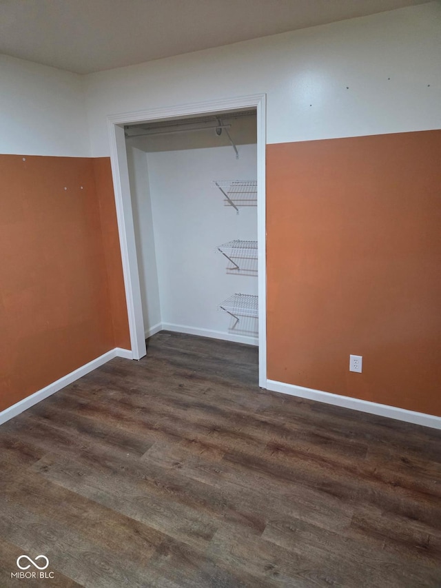 4115 Tansel Rd, Indianapolis, IN 46234 - empty room with dark wood-type flooring and baseboards