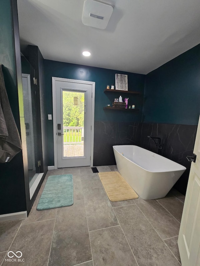 4115 Tansel Rd, Indianapolis, IN 46234 - bathroom with a freestanding bath and recessed lighting