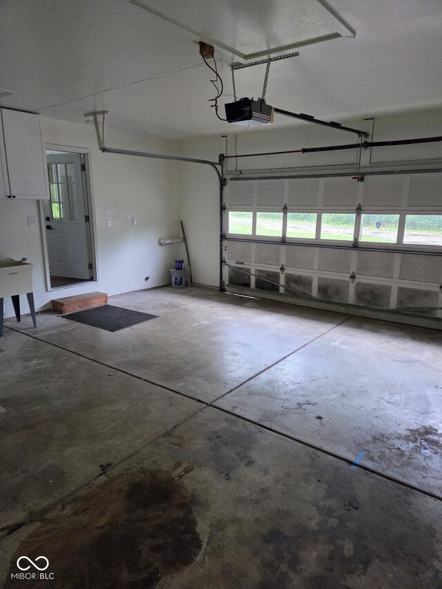 4115 Tansel Rd, Indianapolis, IN 46234 - garage featuring a garage door opener