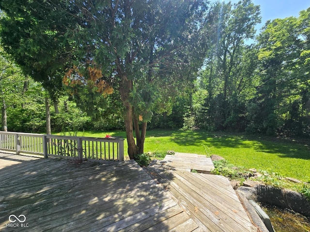 4115 Tansel Rd, Indianapolis, IN 46234 - wooden deck featuring a lawn