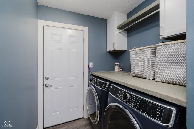 7838 Chesapeake Dr E, Indianapolis, IN 46236 - laundry area with cabinet space, washer and dryer, and wood finished floors