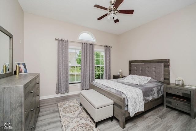 7838 Chesapeake Dr E, Indianapolis, IN 46236 - bedroom featuring light wood-type flooring, baseboards, and a ceiling fan