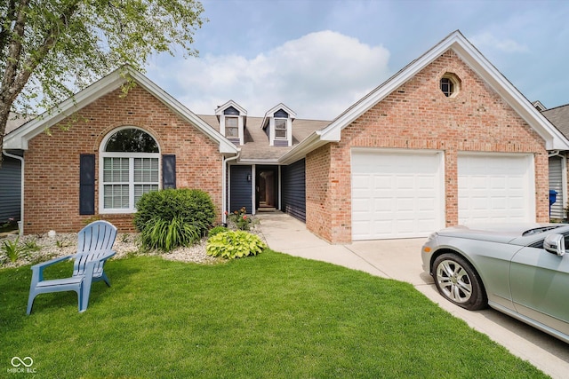 7838 Chesapeake Dr E, Indianapolis, IN 46236 - view of front of property with brick siding, driveway, a front lawn, and an attached garage