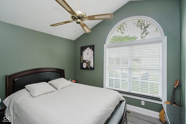7838 Chesapeake Dr E, Indianapolis, IN 46236 - bedroom with lofted ceiling, wood finished floors, baseboards, and ceiling fan