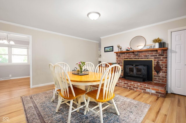9104 W Lone Beech Dr, Muncie, IN 47304 - dining room featuring crown molding, wood finished floors, baseboards, and a chandelier