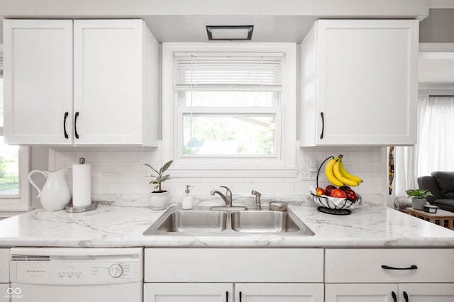 9104 W Lone Beech Dr, Muncie, IN 47304 - kitchen with a sink, dishwasher, white cabinets, and tasteful backsplash